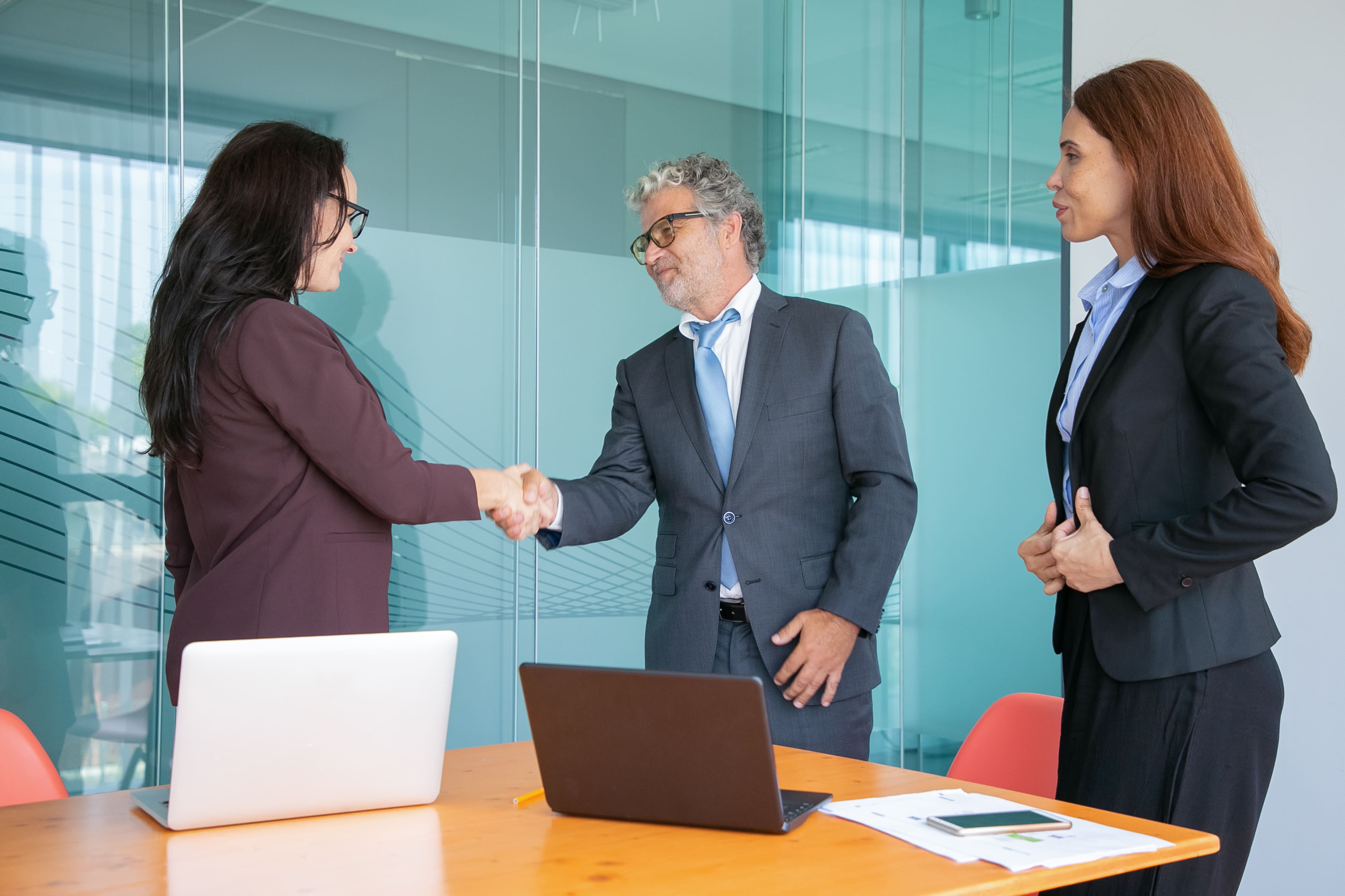 people-handshaking-greeting-each-other